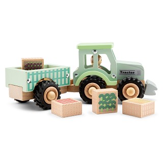 Houten tractor met aanhanger en groente